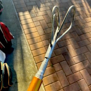 golf ball retriver pole. 
Opens up to 9 feet